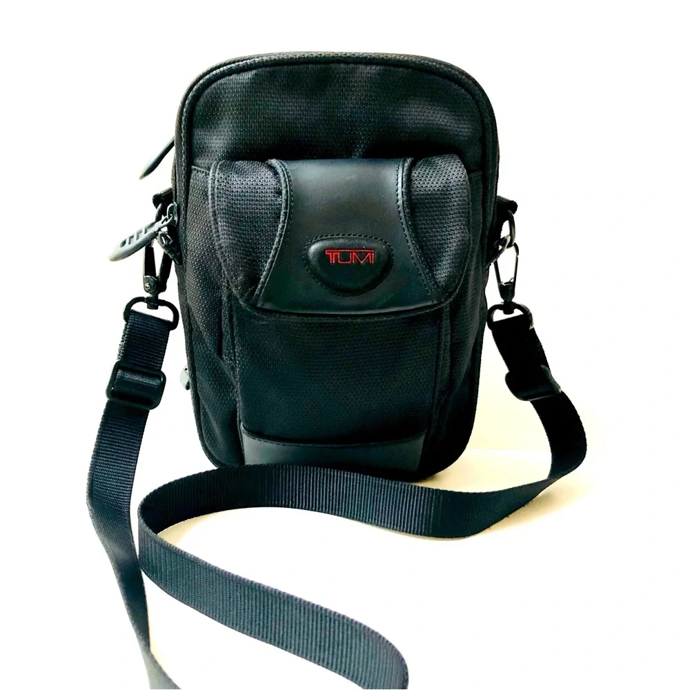 TUMI Leather & Canvas Unisex Shoulder Bag, Gently Used.